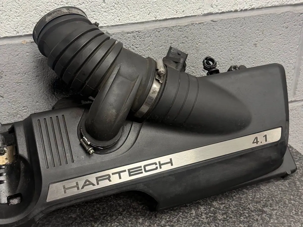 A Porsche airbox in the workshop with a Hartech 4.1 plaque fitted.