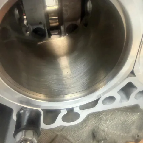 Close-up looking into a new Nikasil-plated liner fitted in a crankcase half.