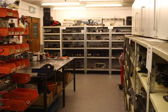The engine strip-down room with racking for components.